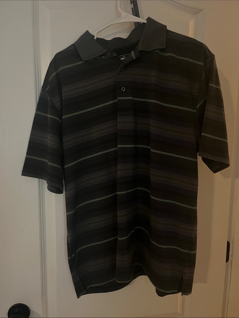 Grand Slam Black Polo with Subtle Green Stripes